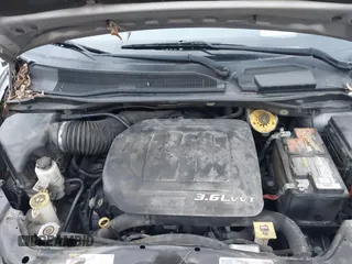 2016 Dodge Grand Caravan SE with VIN 2C4RDGBG1GR401894, listed as a IAAI auction lot 41519412 with 198,444 mi miles and . Bid and sale history available at DreamBid. Image 10.