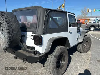 2012 Jeep Wrangler Sport with VIN 1C4GJWAG5CL201499, listed as a Copart auction lot 55247615 with 116,414 mi miles and Clean Title. Bid and sale history available at carsss.com. Image 4.