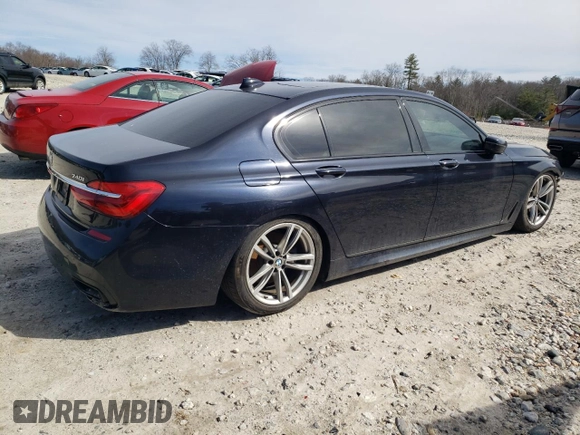 2019 BMW 7 Series 740i xDrive с VIN WBA7E4C51KGV70305, выставлен на аукционе Copart как лот 50009705 с пробегом 129 427 миль миль и Списание • Salvage title. История ставок и продаж доступна на DreamBid. Изображение 3.