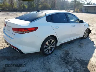 2016 Kia Optima SX Turbo with VIN 5XXGW4L2XGG084628, listed as a IAAI auction lot 41668592 with 116,535 mi miles and . Bid and sale history available at carsss.com. Image 4.