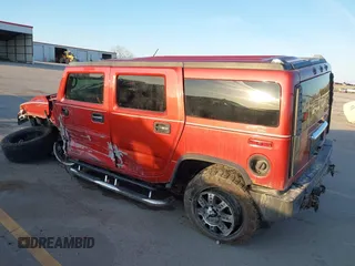 2003 Hummer H2 with VIN 5GRGN23U43H101959, listed as a IAAI auction lot 41771430 with 162,272 mi miles. Bid and sale history available at carsss.com. Image 3.