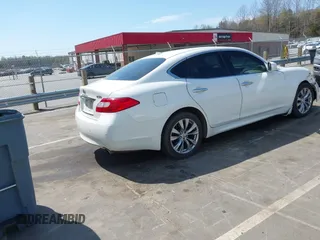 2013 Infiniti M z VIN JN1BY1AR3DM600744, wystawiony jako IAAI lot #41912310 z przebiegiem 200 014 mil mil oraz . Historia ofert i sprzedaży dostępna na DreamBid. Obrazek 4.