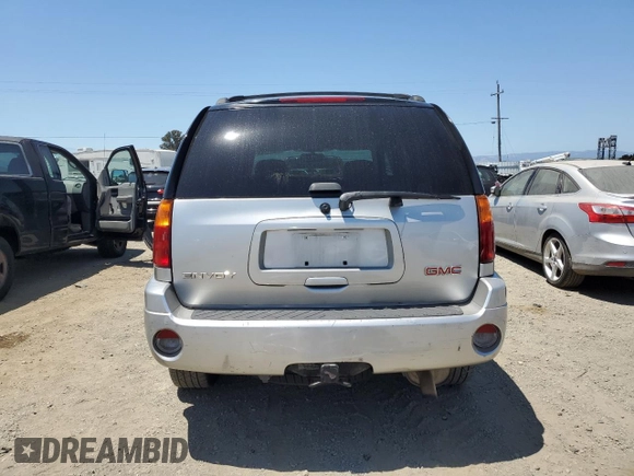2008 GMC Envoy SLT z VIN 1GKDT13S082103595, wystawiony jako Copart lot #58811845 z przebiegiem 146 779 mil mil oraz Szkoda całkowita • Salvage title. Historia ofert i sprzedaży dostępna na DreamBid. Obrazek 6.