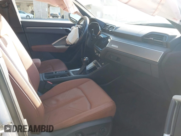 2021 Audi Q3 S line Premium Plus with VIN WA1EECF37M1044601, listed as a IAAI auction lot 41993498 with 15,300 mi miles and . Bid and sale history available at DreamBid. Image 5.
