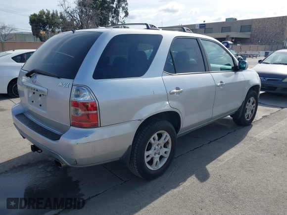 2005 Acura MDX Touring with VIN 2HNYD18935H500957, listed as a IAAI auction lot 41784083 with 250,245 mi miles. Bid and sale history available at carsss.com. Image 4.
