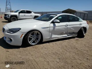 2017 BMW 6 Series 640i z VIN WBA6D0C51HG639445, wystawiony jako Copart lot #58412875 z przebiegiem 22 698 mil mil oraz Szkoda całkowita • Salvage title. Historia ofert i sprzedaży dostępna na DreamBid. Obrazek 1.