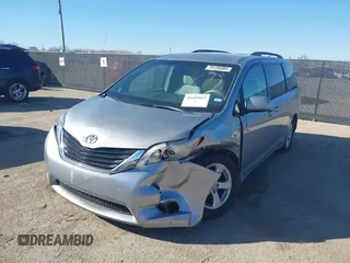 2011 Toyota Sienna LE AAS with VIN 5TDKK3DCXBS143921, listed as a IAAI auction lot 41689053 with 199,854 mi miles. Bid and sale history available at carsss.com. Image 2.