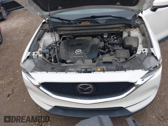 2020 Mazda CX-5 Touring with VIN JM3KFBCM6L0764982, listed as a IAAI auction lot 41632293 with 96,042 mi miles. Bid and sale history available at carsss.com. Image 10.