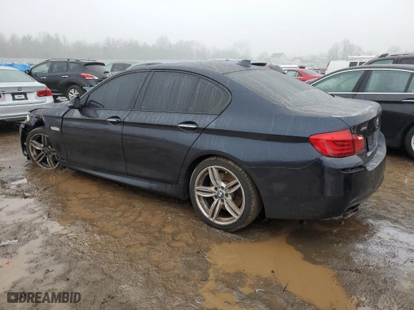 2016 BMW 5 Series 550i xDrive with VIN WBAKP9C58GD980383, listed as a Copart auction lot 38402794 with 64,120 mi miles and Salvage Title. Bid and sale history available at carsss.com. Image 2.