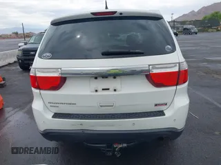 2013 Dodge Durango SXT with VIN 1C4RDJAG7DC659050, listed as a IAAI auction lot 42637236 with 162,458 mi miles and . Bid and sale history available at DreamBid. Image 17.