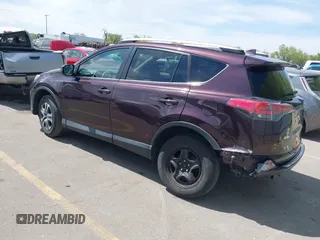 2017 Toyota RAV4 LE with VIN 2T3BFREV4HW580568, listed as a IAAI auction lot 42100704 with 157,300 mi miles and . Bid and sale history available at DreamBid. Image 3.