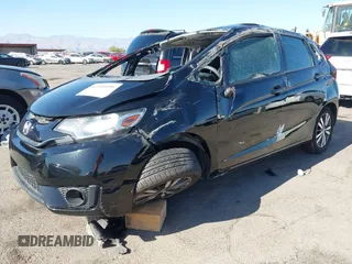 2015 Honda Fit EX-L z VIN 3HGGK5H81FM705199, wystawiony jako IAAI lot #42310099 z przebiegiem Nie podano mil oraz . Historia ofert i sprzedaży dostępna na DreamBid. Obrazek 17.