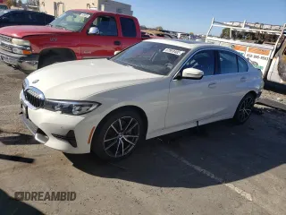 2020 BMW 3 Series 330i with VIN WBA5R1C02LFH48666, listed as a Copart auction lot 67959402 with 57,074 mi miles. Bid and sale history available at carsss.com. Image 1.