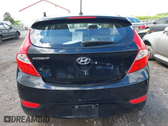 2012 Hyundai Accent SE z VIN KMHCU5AE0CU031475, wystawiony jako IAAI lot #42196146 z przebiegiem 122 489 mil mil oraz . Historia ofert i sprzedaży dostępna na DreamBid. Obrazek 16.