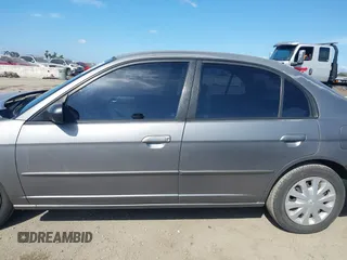 2004 Honda Civic LX with VIN 2HGES16654H579927, listed as a IAAI auction lot 41911814 with 233,803 mi miles. Bid and sale history available at carsss.com. Image 14.