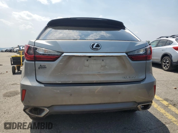 2017 Lexus RX 350 z VIN 2T2BZMCAXHC112957, wystawiony jako Copart lot #60876885 z przebiegiem 66 534 mil mil oraz Szkoda całkowita • Salvage title. Historia ofert i sprzedaży dostępna na DreamBid. Obrazek 6.