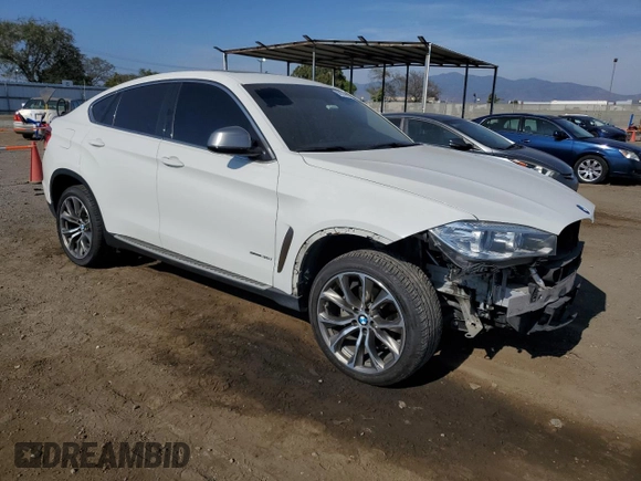 2015 BMW X6 sDrive35i with VIN 5UXKU0C5XF0F92120, listed as a Copart auction lot 58244044 with 157,311 mi miles and Salvage Title. Bid and sale history available at carsss.com. Image 4.