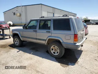 2000 Jeep Cherokee with VIN 1J4FF48S6YL136689, listed as a Copart auction lot 62316245 with 211,100 mi miles and Clean title. Bid and sale history available at DreamBid. Image 2.