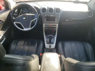 2014 Chevrolet Captiva Sport LT with VIN 3GNAL3EK2ES541243, listed as a Copart auction lot 74417674 with 142,501 mi miles and Salvage Title. Bid and sale history available at DreamBid. Image 8.
