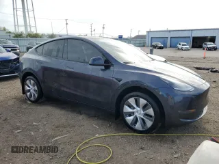 2024 Tesla Model Y Long Range with VIN 7SAYGDEE3RA256304, listed as a Copart auction lot 56160535 with 20,224 mi miles and Salvage title. Bid and sale history available at DreamBid. Image 4.