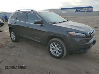 2016 Jeep Cherokee 75th Anniversary with VIN 1C4PJMCBXGW131671, listed as a Copart auction lot 82802204 with 102,795 mi miles and Salvage Title. Bid and sale history available at carsss.com. Image 4.