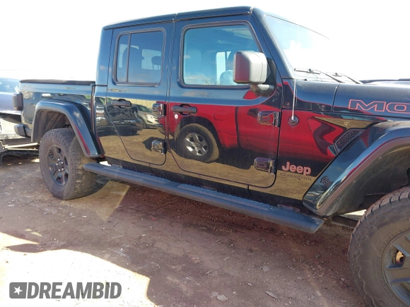 2021 Jeep Gladiator Mojave with VIN 1C6JJTEG9ML528964, listed as a IAAI auction lot 41879113 with 74,315 mi miles and . Bid and sale history available at DreamBid. Image 13.