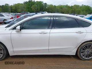 2015 Ford Fusion SE with VIN 3FA6P0HD9FR123677, listed as a IAAI auction lot 42021493 with 166,446 mi miles and . Bid and sale history available at DreamBid. Image 14.