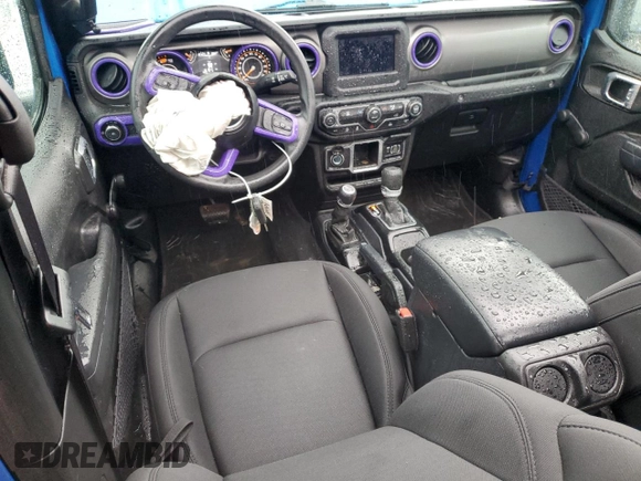 2023 Jeep Wrangler Sport S with VIN 1C4HJXDNXPW543376, listed as a Copart auction lot 86488024 with 35,935 mi miles and Salvage Title. Bid and sale history available at DreamBid. Image 8.