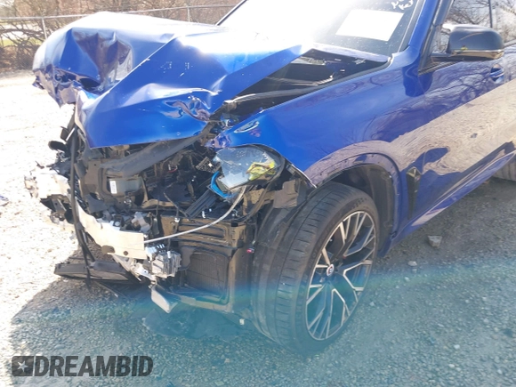 2022 BMW X5 M z VIN 5YMJU0C00N9M64484, wystawiony jako IAAI lot #41825141 z przebiegiem Nie podano mil oraz . Historia ofert i sprzedaży dostępna na DreamBid. Obrazek 12.