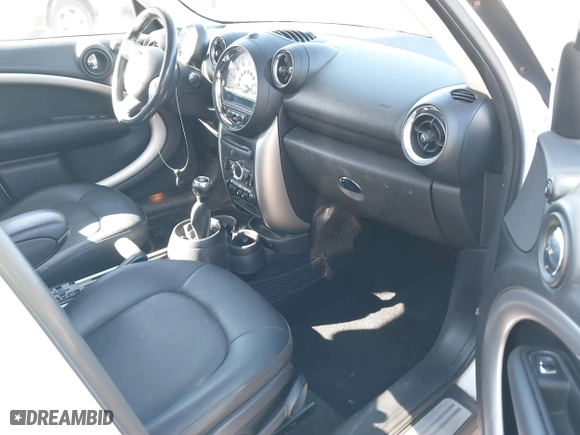 2013 MINI Cooper Countryman with VIN WMWZB3C51DWM31277, listed as a IAAI auction lot 41506486 with 79,006 mi miles. Bid and sale history available at carsss.com. Image 5.