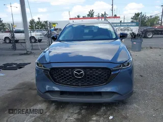 2023 Mazda CX-5 S Carbon Edition z VIN JM3KFBCM5P0179543, wystawiony jako IAAI lot #41950082 z przebiegiem 31 573 mil mil oraz . Historia ofert i sprzedaży dostępna na DreamBid. Obrazek 13.