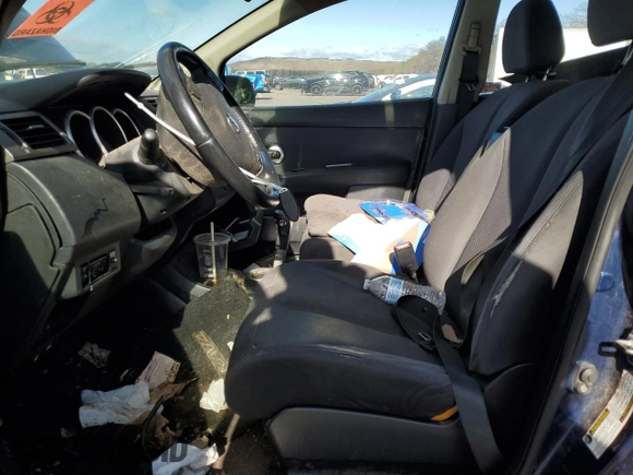 2009 Nissan Versa 1.8 S with VIN 3N1BC11E69L441683, listed as a Copart auction lot 43377925 with 111,958 mi miles and Salvage Title. Bid and sale history available at carsss.com. Image 7.