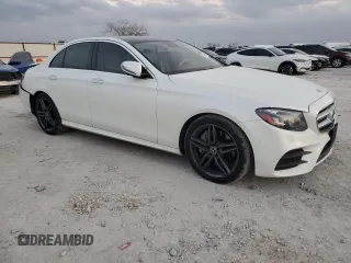 2019 Mercedes-Benz E-Class E 300 with VIN WDDZF4JB1KA512012, listed as a Copart auction lot 46902445 with 59,090 mi miles and Salvage Title. Bid and sale history available at carsss.com. Image 4.