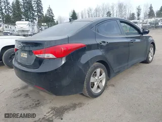 2011 Hyundai Elantra Ltd with VIN KMHDH4AE8BU084832, listed as a IAAI auction lot 41455695 with 176,634 mi miles. Bid and sale history available at carsss.com. Image 4.