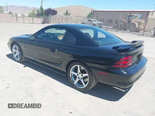 1994 Ford Mustang with VIN 1FALP42D5RF184075, listed as a IAAI auction lot 42679810 with 7,210 mi miles and . Bid and sale history available at DreamBid. Image 3.