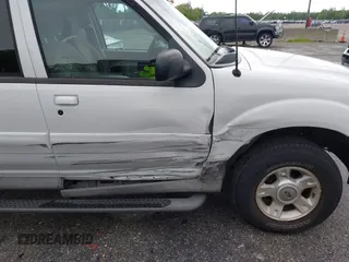2003 Ford Explorer Sport Trac XLS с VIN 1FMDU77E63UA59921, выставлен на аукционе IAAI как лот 42531819 с пробегом 90 069 миль миль и . История ставок и продаж доступна на DreamBid. Изображение 6.