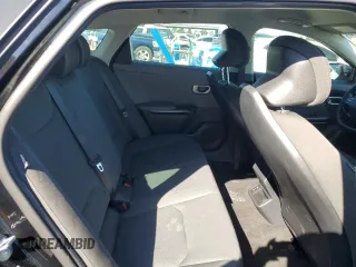 2025 Kia K4 LXS with VIN 3KPFT4DE2SE040332, listed as a Copart auction lot 49078615 with 8,977 mi miles and Salvage Title. Bid and sale history available at carsss.com. Image 10.