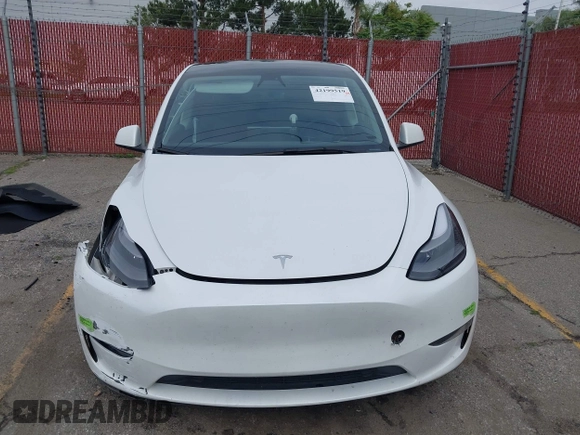 2023 Tesla Model Y Long Range with VIN 7SAYGAEE9PF702910, listed as a IAAI auction lot 42199519 with 91,094 mi miles and . Bid and sale history available at DreamBid. Image 12.