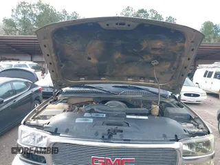2001 GMC Yukon SLT with VIN 1GKEK13V11R220343, listed as a IAAI auction lot 41703786 with 213,518 mi miles. Bid and sale history available at carsss.com. Image 10.