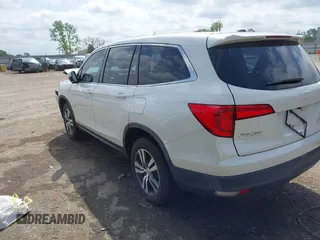2017 Honda Pilot EX-L with VIN 5FNYF6H5XHB005000, listed as a IAAI auction lot 42039832 with 141,592 mi miles and . Bid and sale history available at DreamBid. Image 3.