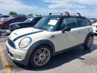 2007 MINI Hardtop S with VIN WMWMF73567TL89619, listed as a IAAI auction lot 42807828 with 201,371 mi miles and . Bid and sale history available at DreamBid. Image 2.