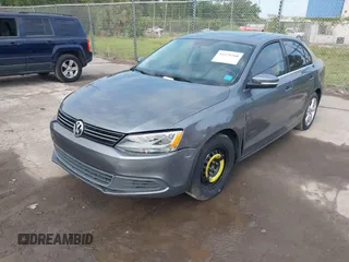 2014 Volkswagen Jetta TDI with VIN 3VWLL7AJ0EM386019, listed as a IAAI auction lot 42229260 with 122,858 mi miles and . Bid and sale history available at DreamBid. Image 2.