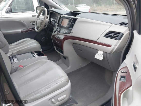 2012 Toyota Sienna XLE AAS with VIN 5TDYK3DC2CS276118, listed as a IAAI auction lot 41834422 with 143,043 mi miles. Bid and sale history available at carsss.com. Image 5.