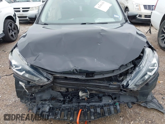 2018 Nissan Sentra SR Turbo с VIN 3N1CB7AP7JY204123, выставлен на аукционе IAAI как лот 42205425 с пробегом 76 647 миль миль и . История ставок и продаж доступна на DreamBid. Изображение 6.