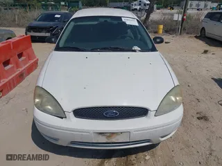 2006 Ford Taurus SE with VIN 1FAHP532X6A257510, listed as a IAAI auction lot 41892422 with 130,633 mi miles. Bid and sale history available at carsss.com. Image 6.