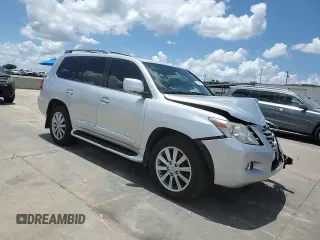 2011 Lexus LX 570 with VIN JTJHY7AX4B4061716, listed as a Copart auction lot 62327925 with 141,382 mi miles and Salvage title. Bid and sale history available at DreamBid. Image 14.