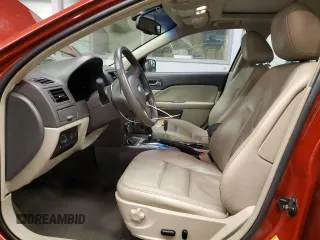 2010 Ford Fusion SEL with VIN 3FAHP0JA0AR239335, listed as a Copart auction lot 86290354 with 28,915 mi miles and Salvage Title. Bid and sale history available at DreamBid. Image 7.