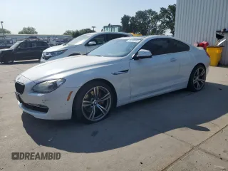 2012 BMW 6 Series 650i xDrive z VIN WBALX5C5XCC894182, wystawiony jako Copart lot #60100065 z przebiegiem 110 187 mil mil oraz Szkoda całkowita • Salvage title. Historia ofert i sprzedaży dostępna na DreamBid. Obrazek 1.