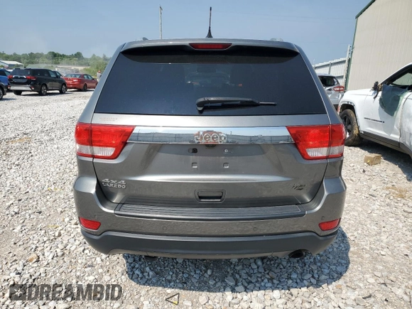 2011 Jeep Grand Cherokee Laredo с VIN 1J4RR4GG6BC738081, выставлен на аукционе Copart как лот 58740345 с пробегом 150 374 миль миль и Списание • Salvage title. История ставок и продаж доступна на DreamBid. Изображение 6.