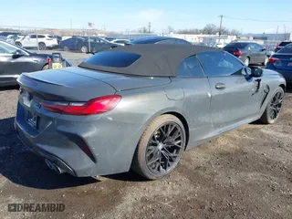 2020 BMW M8 with VIN WBSDZ0C06LBM09446, listed as a IAAI auction lot 41512994 with 25,745 mi miles. Bid and sale history available at carsss.com. Image 4.